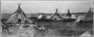 Black and white photo of tipis